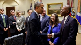 President Barack Obama greets participants In the Roosevelt Room of the White House prior to signing the Jumpstart Our Business Startups (JOBS) Act, April 5, 2012.