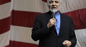 Imam Feisal Abdul Rauf — seen here at a March rally — co-founded a project to develop a Muslim center near ground zero. He believes that Osama bin Laden's death will improve perception of Muslims.