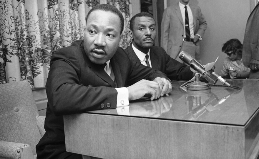 <p>At a news conference in 1963, the Rev. Martin Luther King Jr. and Shuttlesworth tell the media that massive demonstrations will continue in Birmingham.</p>