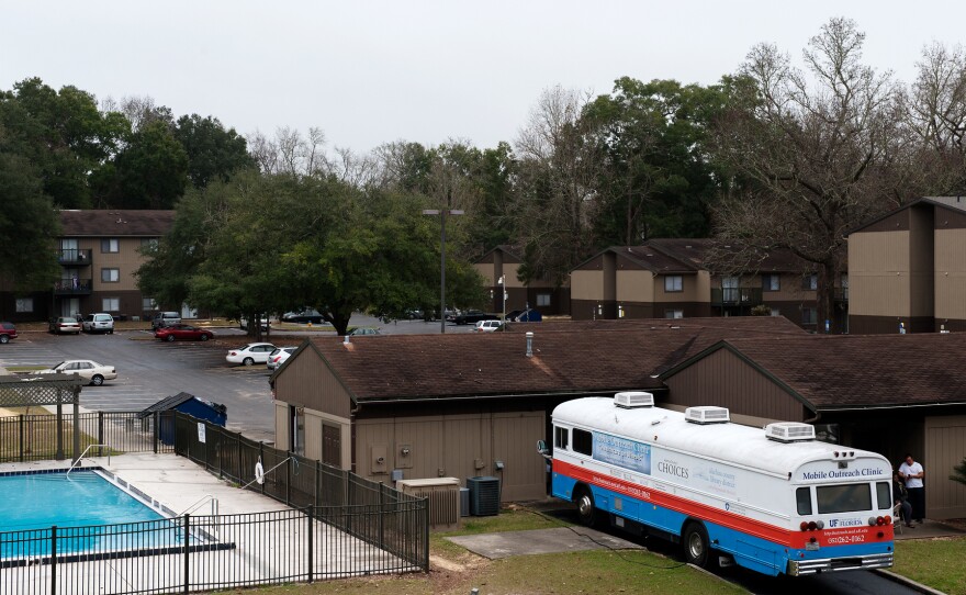 Dr. Nancy Hardt's free "clinic on wheels," parked in December at an apartment complex in Gainesville, Fla., gets about 5,000 visits from patients each year.