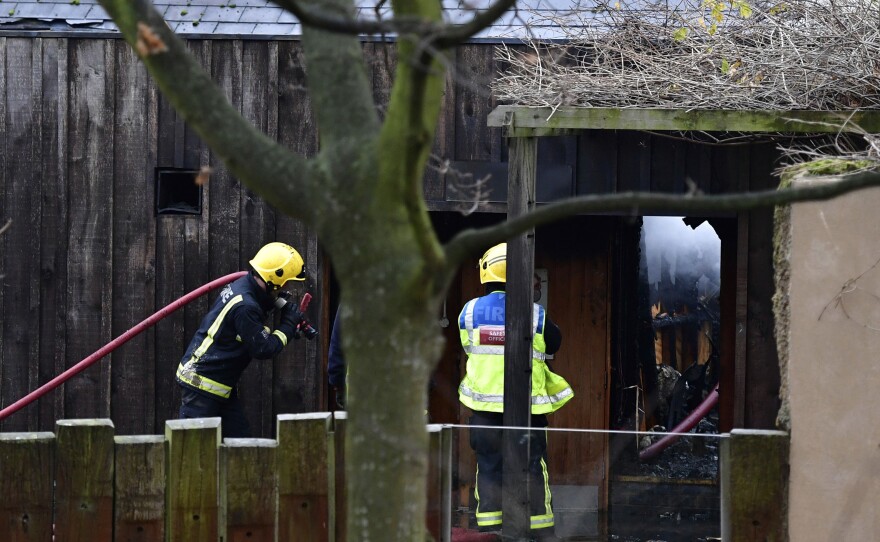 Firefighters at the London Zoo on Saturday, where an early morning fire killed at least one animal.