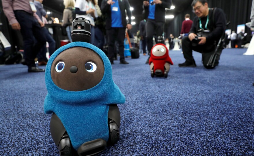Lovot companion robots by Groove X wander at the Consumer Electronics Show in Las Vegas.