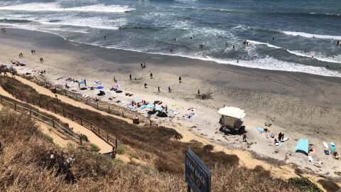 Crowds gather at Leucadia State Beach in Encinitas, California, July 3, 2020.