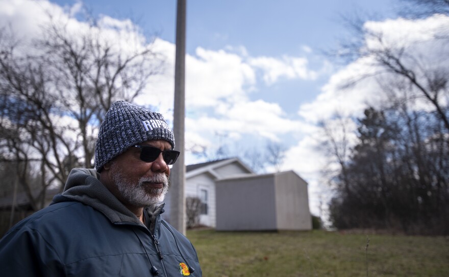 Peter Baker walks near the clubhouse at Lake Ivanhoe on Saturday, April 16, 2022.