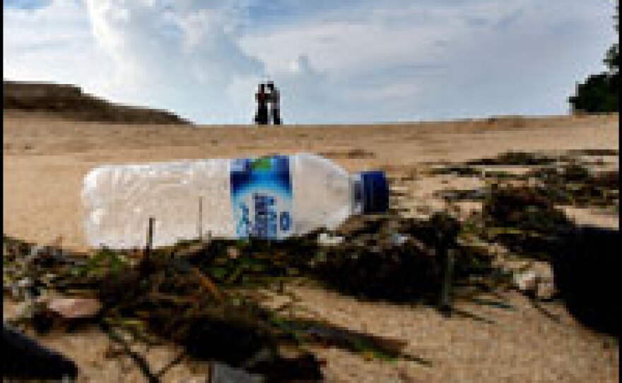 A plastic bottle on a beach on the Indonesian island of Bali.