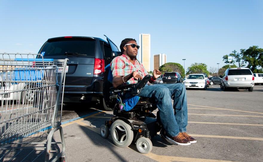 Nnaka runs an errand at a local Wal-Mart before heading home in Tulsa. Before he got his own van, Nnaka had to rely on a special lift service provided by the city to get around.