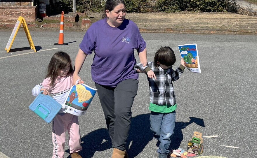 Tracy Hobbs brought her 5-year-old twins to a mobile clinic to get their measles, mumps and rubella vaccines.  She was reluctant to vaccinate her kids because of misinformation, but changed her mind. The measles isn't something to play with, Hobbs said.