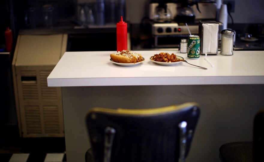 During the auto industry's boom years, Red Hots was so busy that the cook would prepare bag lunches of two Coneys for Ford autoworkers to pick up on their break.