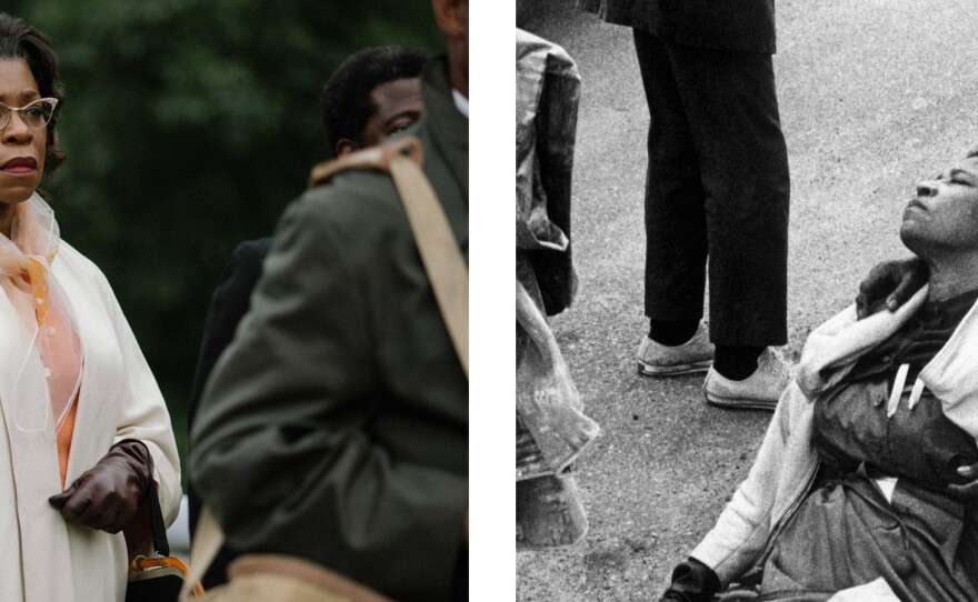 Lorraine Toussaint, left, plays Amelia Boynton — seen at right being cared for by an unnamed marcher after being knocked unconscious in the police attack on Selma protesters.