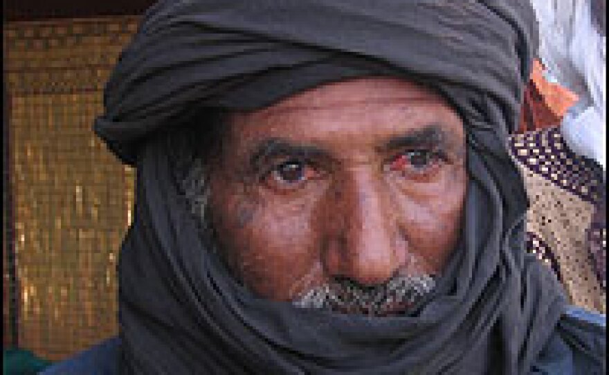 Chief elder Mohammad Ag Mata has reluctantly succumbed to the new way of life for the Tuareg nomads, although he believes it is necessary for his community's survival.
