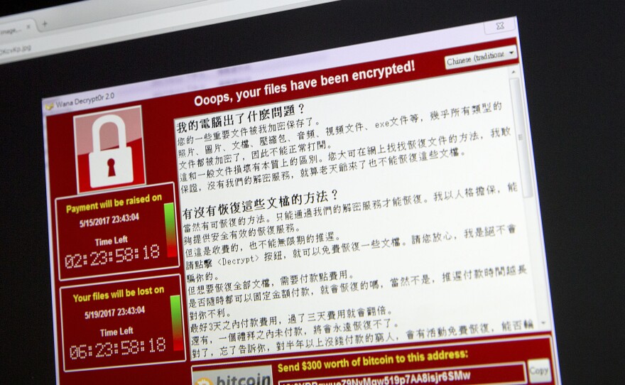 A screenshot of the warning screen from a purported ransomware attack on a laptop in Beijing.