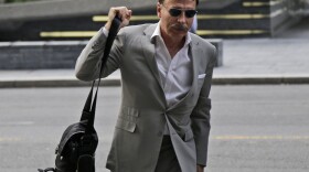 St. Louis Rams owner Stan Kroenke arrives at a hotel where NFL meetings were taking place in New York, Oct. 7, 2014.