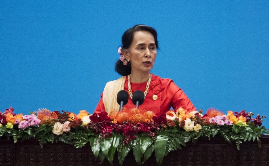 Myanmar's civilian leader Aung San Suu Kyi gives a speech this month in Beijing. The U.N. human rights chief says she could be held responsible for her country's brutal treatment of the Rohingya.