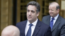 Michael Cohen, center, leaves court in New York, Wednesday, May 30, 2018.