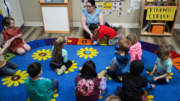 Family educator Lisa Benson-Nuyen addresses her students in a circle in the Northern Lights classroom at the Meadow Lakes CCS Early Learning, a Head Start center, in Wasilla, Alaska, in 2024. The center has since closed because of a lack of staff and money.