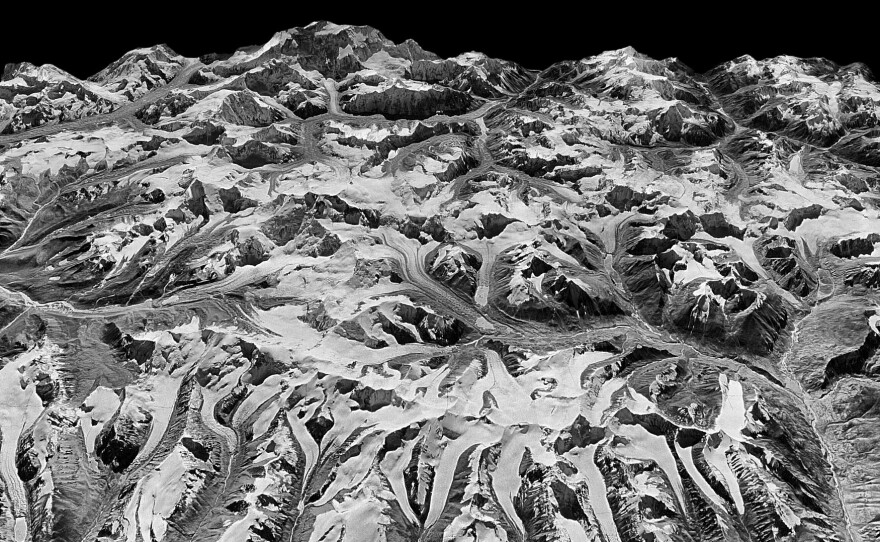 This oblique view of the Himalayan landscape was captured by a KH-9 Hexagon satellite on Dec. 20, 1975, on the border between eastern Nepal and Sikkim, India.