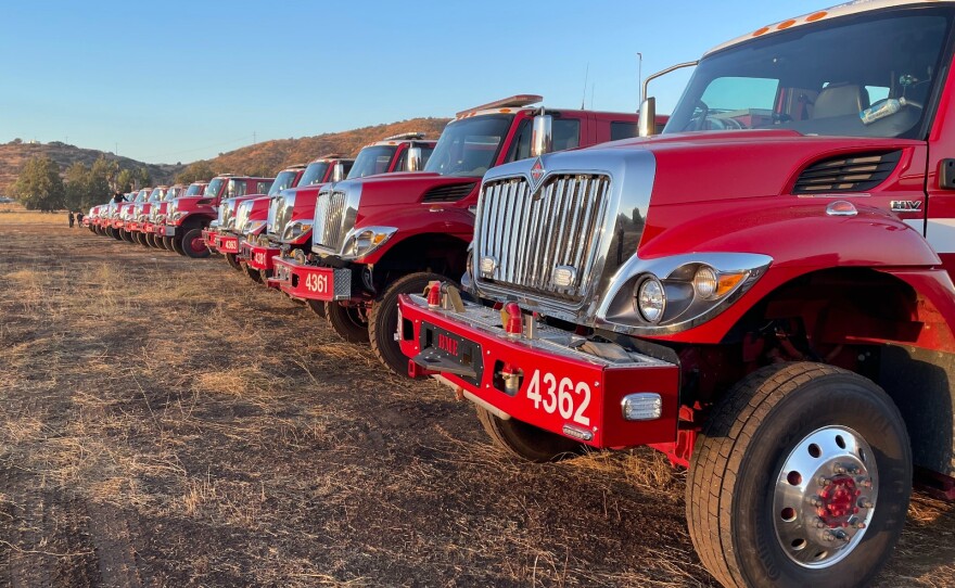 A row of fire engines fighting the Border 32 Fire, Sept. 3, 2022.