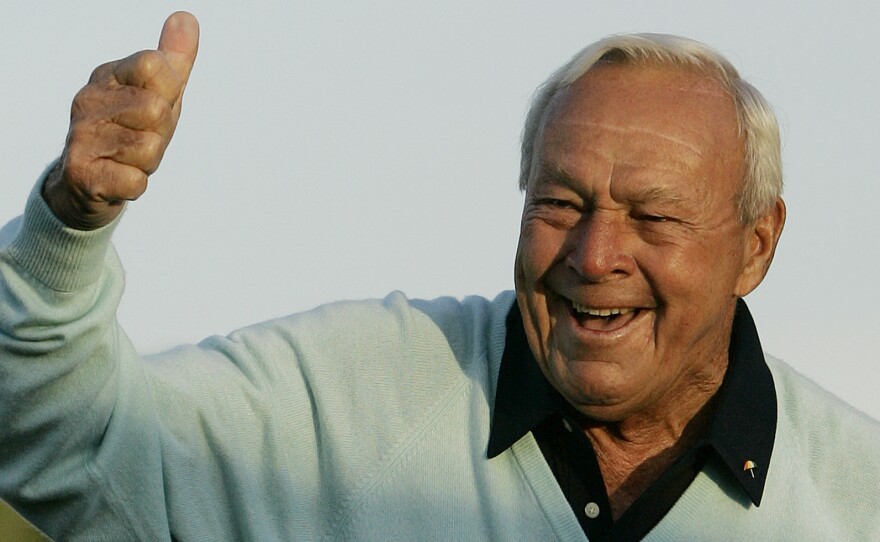 Arnold Palmer acknowledges the crowd after hitting the ceremonial first tee shot at the 2007 Masters tournament.