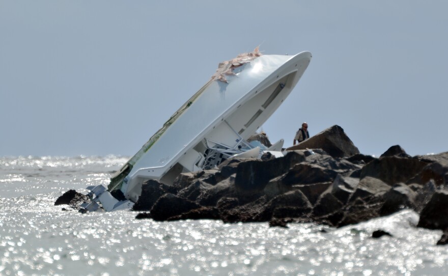 An image from Sunday morning of the boat that crashed into a jetty off Miami Beach, killing 3 people including Miami Marlins pitcher José Fernández.