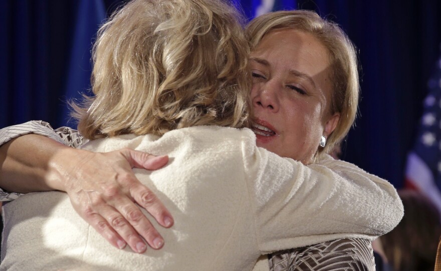 Sen. Mary Landrieu, D-La., hugs supporters after conceding defeat in her Senate runoff election against Rep. Bill Cassidy, R-La., on Saturday.