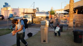A man walks away from a handwashing station in Calexico’s Border Friendship Park on April 21, 2020. The portable stations are brought to the park every evening during dinners held for homeless residents. 