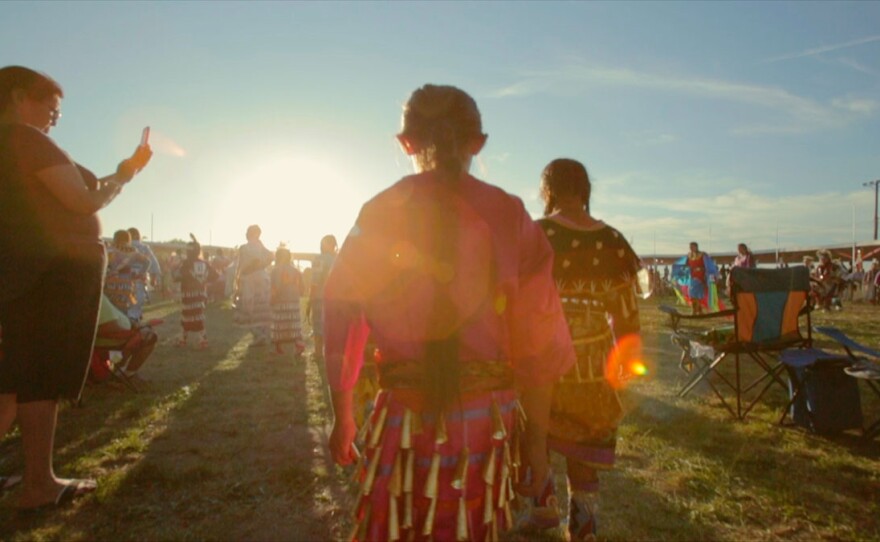 Youth Jingle Dress dancers enter the arena - 140th Annual Rosebud Fair and Wacipi