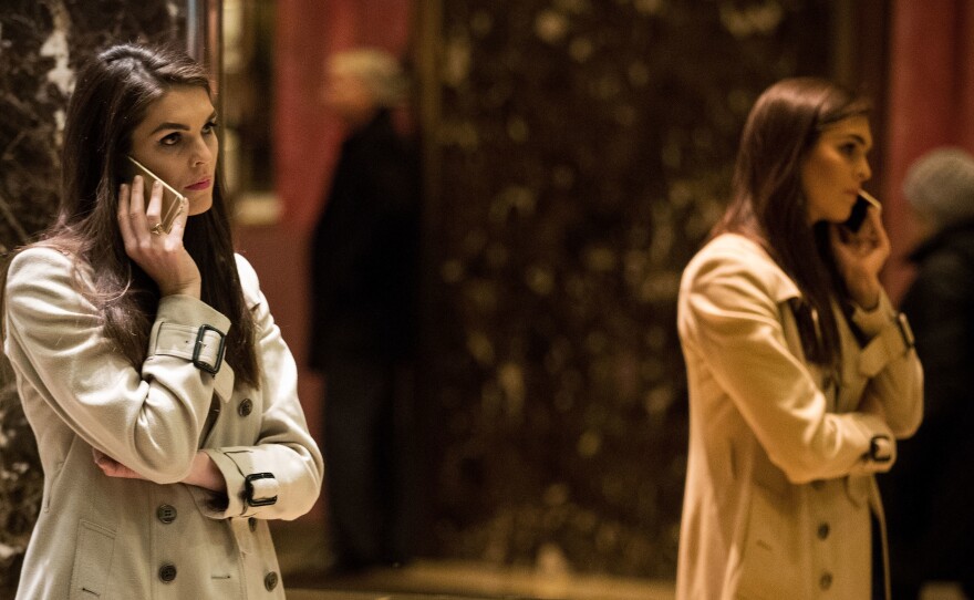 Hope Hicks talks on her phone in the lobby at Trump Tower on December 2016. Her professional style stands in stark contrast to the man who immediately preceded her as communications director, Anthony Scaramucci.