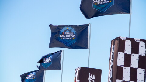 Nascar flags raised at NASCAR San Diego Weekend presented by Anduril at Naval Base Coronado on June 19, 2026.