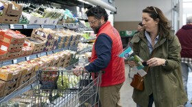 Rich Henderson and his wife, Rachel Negro-Henderson, grocery shop for their family at the Aldi in Bellmawr, New Jersey.