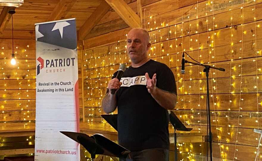 Rev. Ken Peters, a fifth-generation minister, leads the Sunday service at the Patriot Church in Lenoir City, Tennessee.