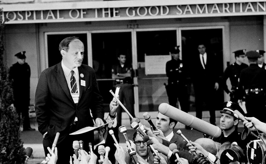 Frank Mankiewicz, Sen. Robert F. Kennedy's press secretary, updates the press about Kennedy's condition after being shot in June 1968. Mankiewicz died Thursday at the age of 90.