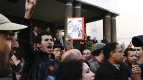 Tunisian students living in Morocco protest the regime of their country's then-president, Zine El Abidine Ben Ali, on  Jan. 13.