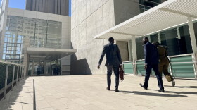 Attorney Wismick Saint-Jean walks into the United States Courthouse in downtown San Diego alongside his paralegal and Haitian Bridge Alliance co-founder Wister Gaetan, Oct, 16. 2026.