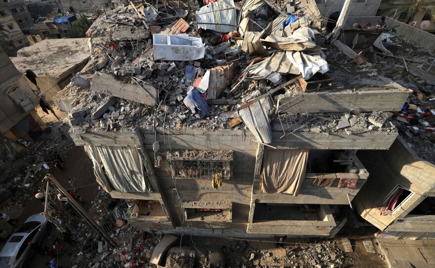 An overview of a destroyed building following Israeli bombardment of Khan Younis overnight into Friday.