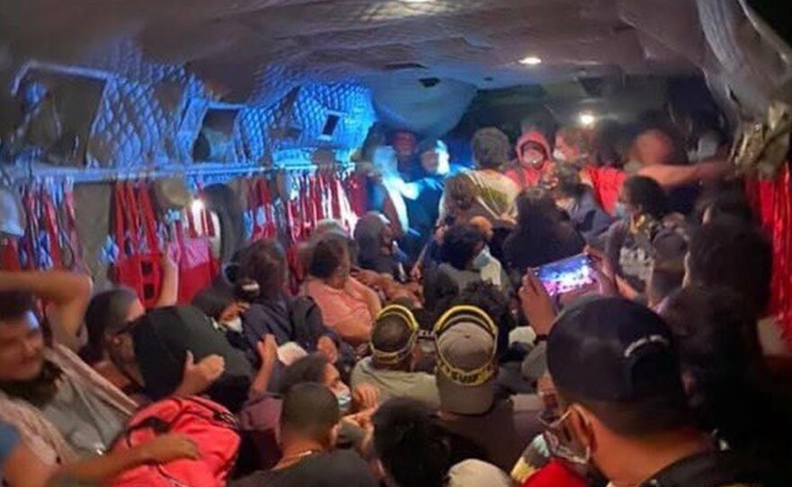 Dozens of evacuees are evacuated to safety on a Cal Guard Chinook on Saturday, after the Creek Fire in central California left them stranded. More than 200 people were airlifted to safety after the fast-moving wildfire trapped them in a popular camping area in Sierra National Forest.