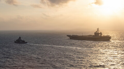Royal Australian Navy frigate HMAS Perth sails alongside the aircraft carrier USS George Washington in the South China Sea, Aug. 11, 2026.