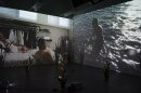 The video "Isla Flotante/Floating Island" by Jezabeth Roca Gonzalez is shown installed in an undated photo.