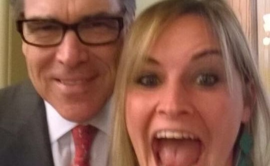 Maggie Fitzgerald, seen here with former Texas Gov. Rick Perry, just might hold the record for most selfies with 2016 presidential candidates. A state lobbyist based in Des Moines, she has also posed with Bobby Jindal, Donald Trump, Ben Carson and Hillary Clinton.