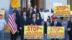 Assemblyman Tim Donnelly (R-Twin Peaks) speaks at a rally for an Arizona-style immigration bill in California. 
