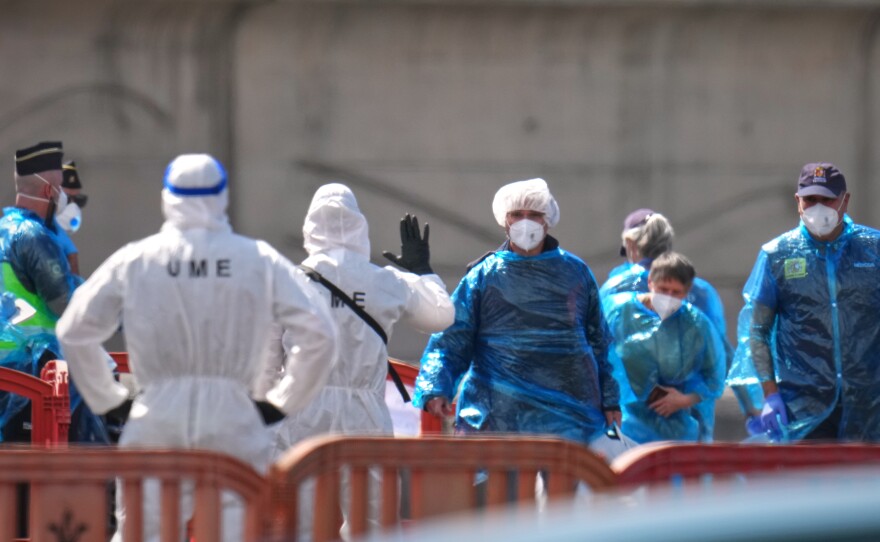 Members of the press report from an expected reception point for passengers from the MV Hondius at the Granadilla Port on May 09, 2026 in Tenerife, part of the Canary Islands, Spain.