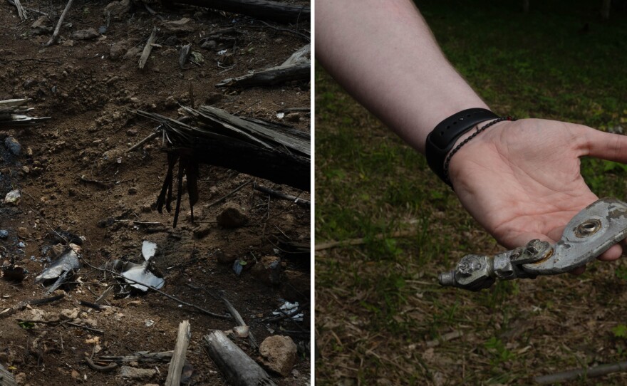 Debris litters the ground in the woods near Zhytomyr where the jet crashed, killing its 27-year-old pilot, tearing through the forest canopy and spewing fuel. Then it exploded and a wildfire followed.