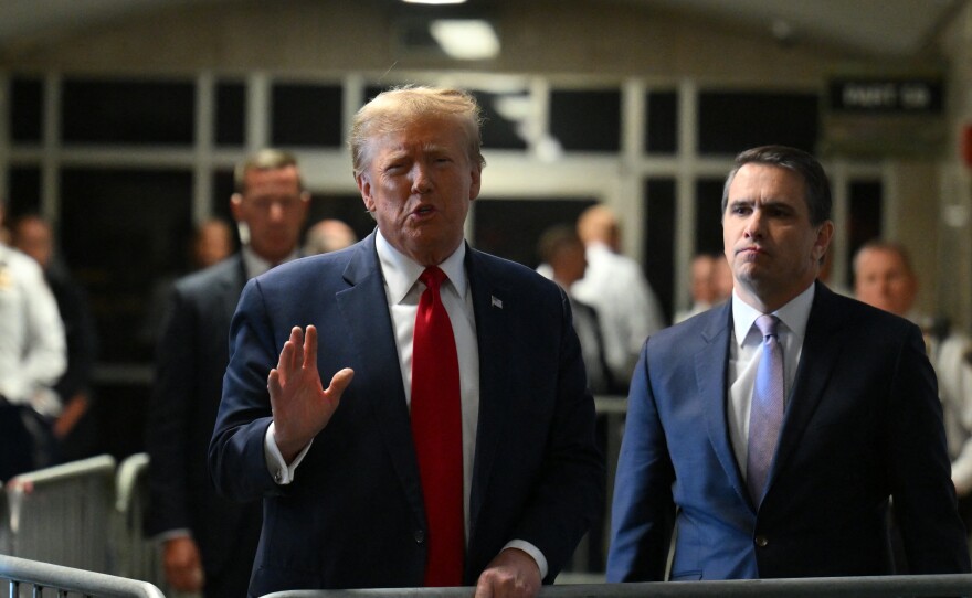 Former President Donald Trump speaks to the press at Manhattan criminal court after a hearing on Feb. 15.