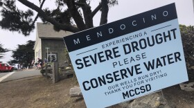 Signs alert visitors to the severe drought in Mendocino, Calif., on Wednesday, Aug. 4, 2021. 