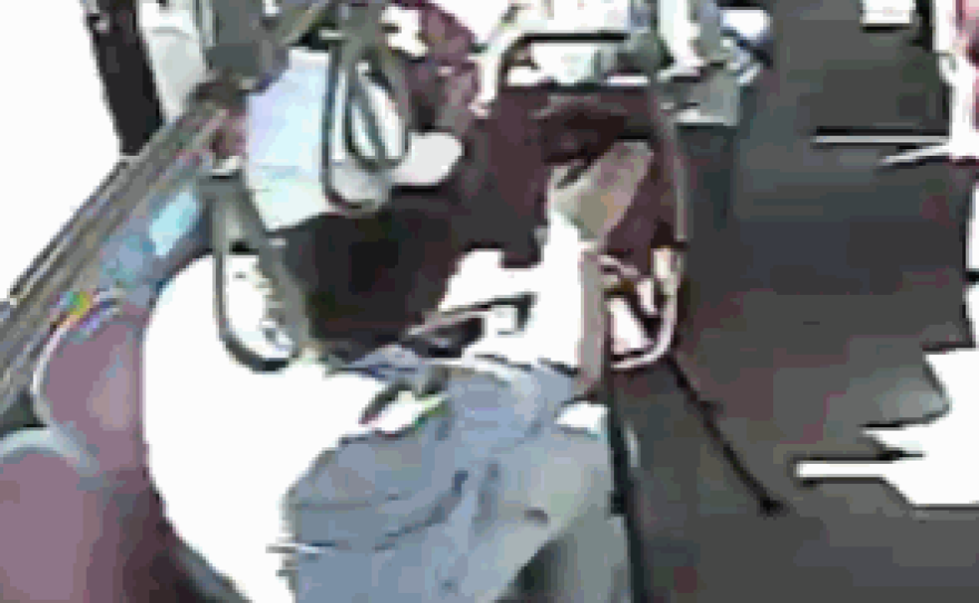 KPBS videographer Nic McVicker is seen filming on an MTS bus in this surveillance footage.