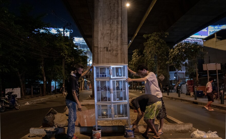 A community food pantry is installed under an expressway in the Din Daeng area of Bangkok. The community pantry, with food donated by citizens, was started by a volunteer group called Little Bricks and modeled after Little Free Pantries, founded by Jessica McClard in Fayetteville, Arkansas.