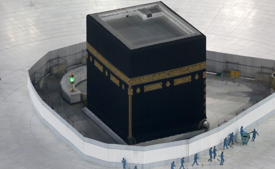 The area around the Kaaba, the cubic building at the Grand Mosque in the Muslim holy city of Mecca, Saudi Arabia, was closed and disinfected in March. Officials have announced that this year's hajj will be restricted because of the pandemic.