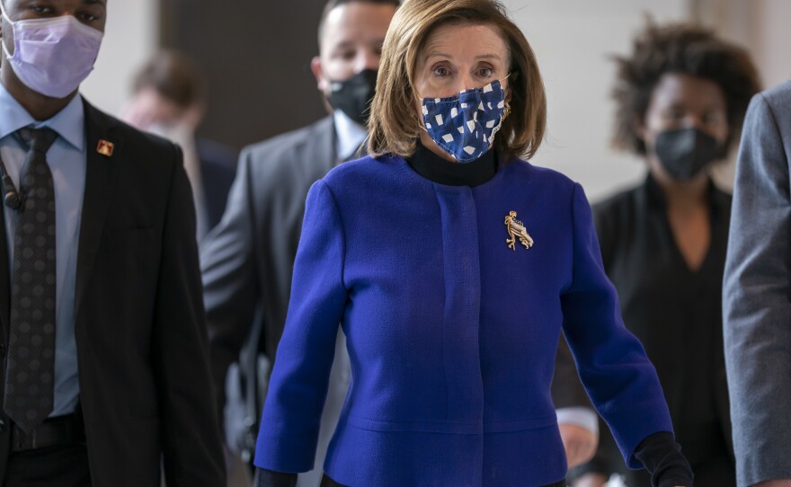 House Speaker Nancy Pelosi, D-Calif., arrives at the Capitol Thursday to update reporters on the must-pass priority of funding the government.