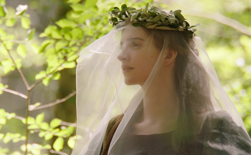 Fattori May appears as Beatrice Portinari in the reenactment of Purgatorio of the Divine Comedy. Original footage shot at Pineta di Classe (Pine Forest of Classe).