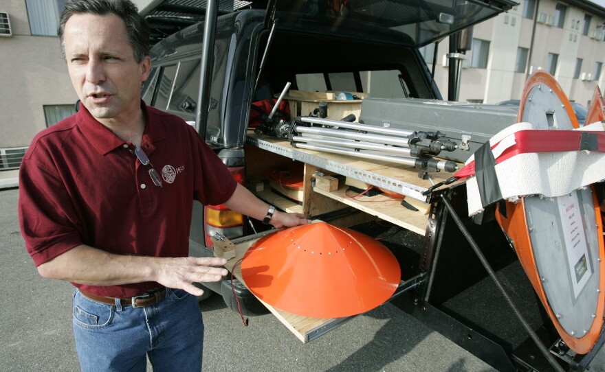 Tornado chaser Tim Samaras shows the probes he used when trying to collect data from a tornado. This photo was taken May 26, 2006, in Ames, Iowa.