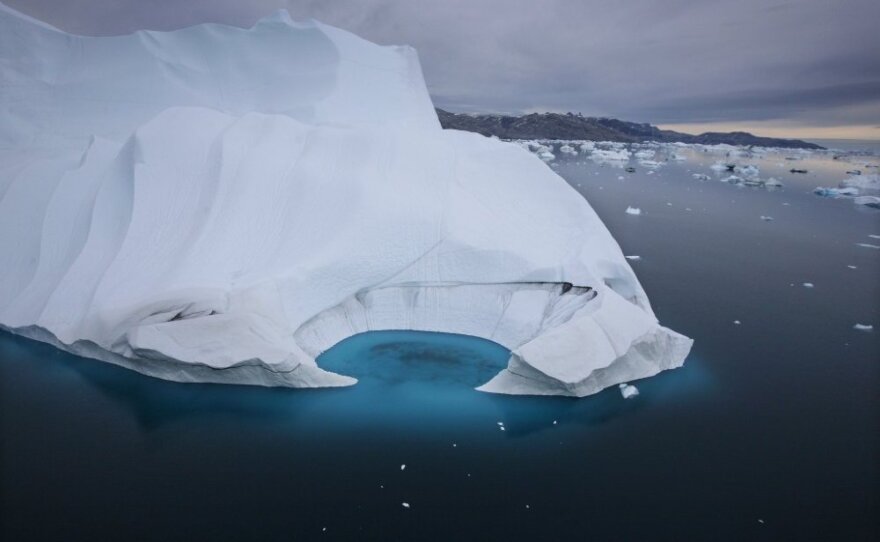 An iceberg is seen melting off the coast of Ammasalik, Greenland, in July 2007. This year, scientists say sea-ice extent in the Arctic has reached its lowest level since monitoring by satellite began in 1979, the result of rising temperatures.